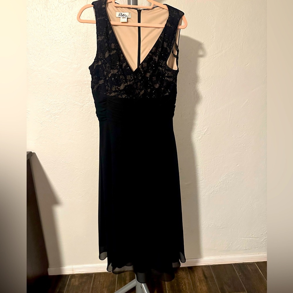 Sleeveless black cocktail dress